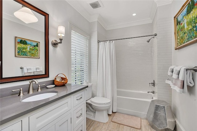 full bathroom with shower / bath combination with curtain, vanity, toilet, and crown molding