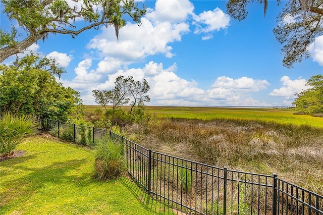 view of yard with a rural view