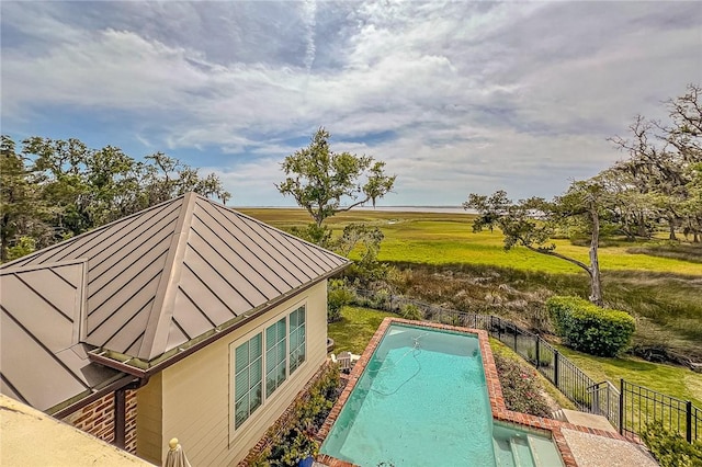 view of pool with a rural view and central AC