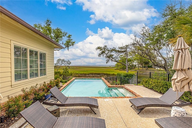 view of swimming pool featuring a patio