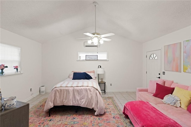 165 Pine Cir, Brunswick, GA 31520 - bedroom with tile patterned flooring, lofted ceiling, multiple windows, a wall mounted AC, and a textured ceiling
