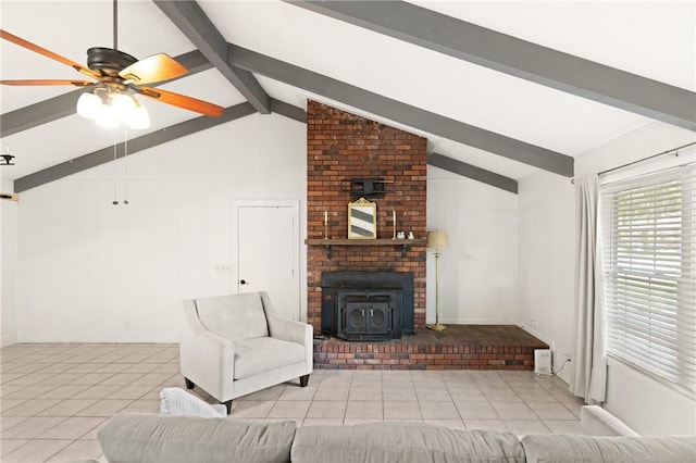 165 Pine Cir, Brunswick, GA 31520 - tiled living room featuring a wood stove and ceiling fan