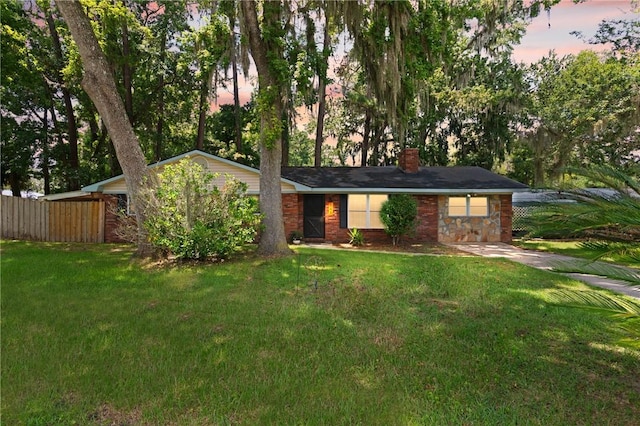 165 Pine Cir, Brunswick, GA 31520 - ranch-style house featuring a chimney