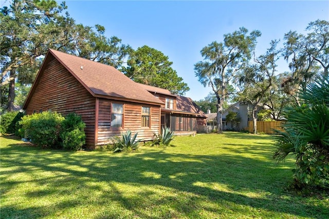 exterior space with a yard