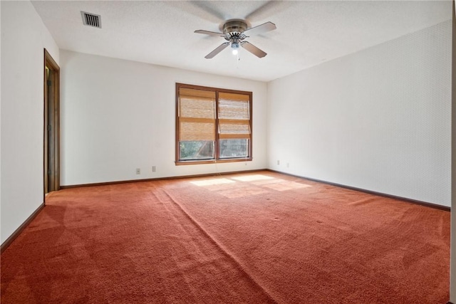 carpeted empty room with ceiling fan