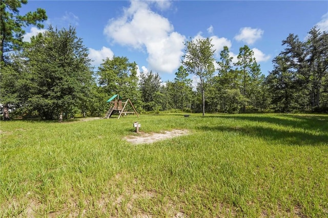 76 Red Gate Rd, Waynesville, GA 31566 - view of yard featuring a playground