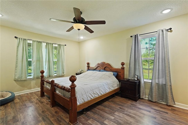 76 Red Gate Rd, Waynesville, GA 31566 - bedroom with wood finished floors, a ceiling fan, a textured ceiling, and recessed lighting