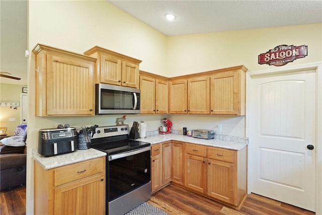 76 Red Gate Rd, Waynesville, GA 31566 - kitchen with appliances with stainless steel finishes, dark wood-type flooring, and light brown cabinets