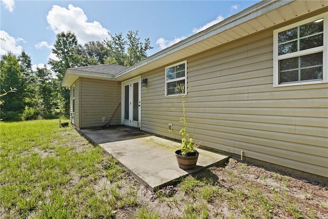 76 Red Gate Rd, Waynesville, GA 31566 - property entrance featuring a patio area and french doors