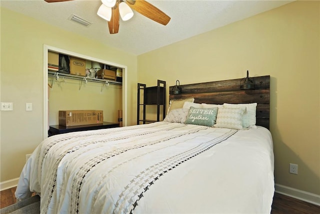 76 Red Gate Rd, Waynesville, GA 31566 - bedroom with a closet, a ceiling fan, and wood finished floors
