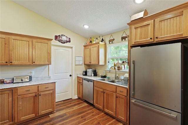 76 Red Gate Rd, Waynesville, GA 31566 - kitchen with appliances with stainless steel finishes, a textured ceiling, dark wood-style floors, lofted ceiling, and recessed lighting