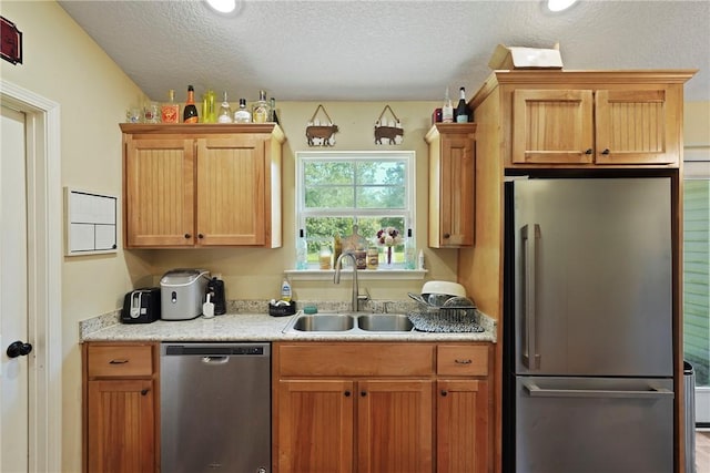 76 Red Gate Rd, Waynesville, GA 31566 - kitchen with stainless steel appliances, light countertops, and a textured ceiling