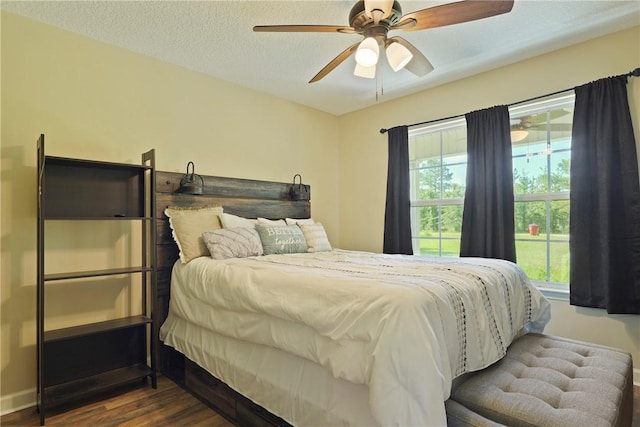 76 Red Gate Rd, Waynesville, GA 31566 - bedroom featuring dark wood-style flooring and a ceiling fan
