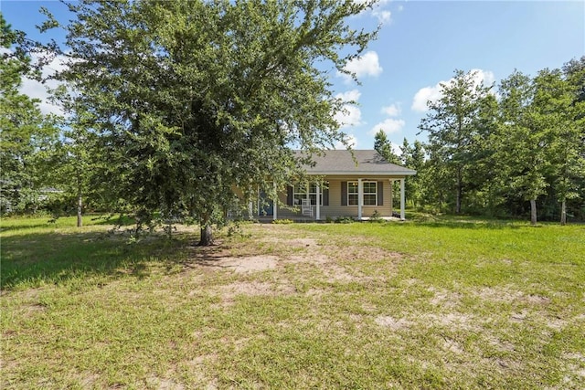 76 Red Gate Rd, Waynesville, GA 31566 - view of grassy yard featuring covered porch