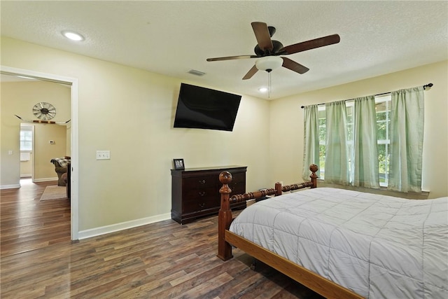 76 Red Gate Rd, Waynesville, GA 31566 - bedroom featuring wood finished floors, a ceiling fan, recessed lighting, and a textured ceiling