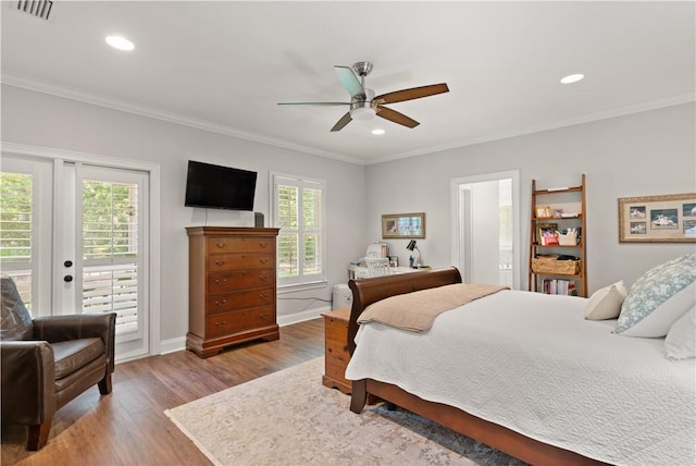 149 Harbor Pointe Dr, Brunswick, GA 31523 - bedroom featuring access to exterior, wood finished floors, baseboards, ornamental molding, and recessed lighting