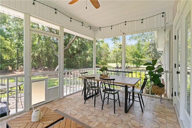 149 Harbor Pointe Dr, Brunswick, GA 31523 - sunroom / solarium with outdoor dining space, a ceiling fan, view of scattered trees, and healthy amount of natural light