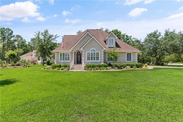 149 Harbor Pointe Dr, Brunswick, GA 31523 - view of front of home featuring a front lawn and stucco siding
