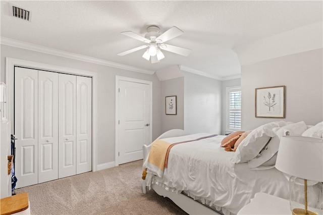 149 Harbor Pointe Dr, Brunswick, GA 31523 - bedroom featuring carpet floors, ornamental molding, a closet, a ceiling fan, and baseboards