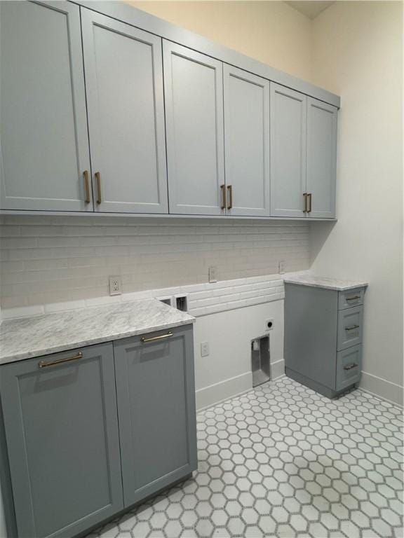 104 Point Ln, Saint Simons Island, GA 31522 - laundry room with electric dryer hookup and baseboards