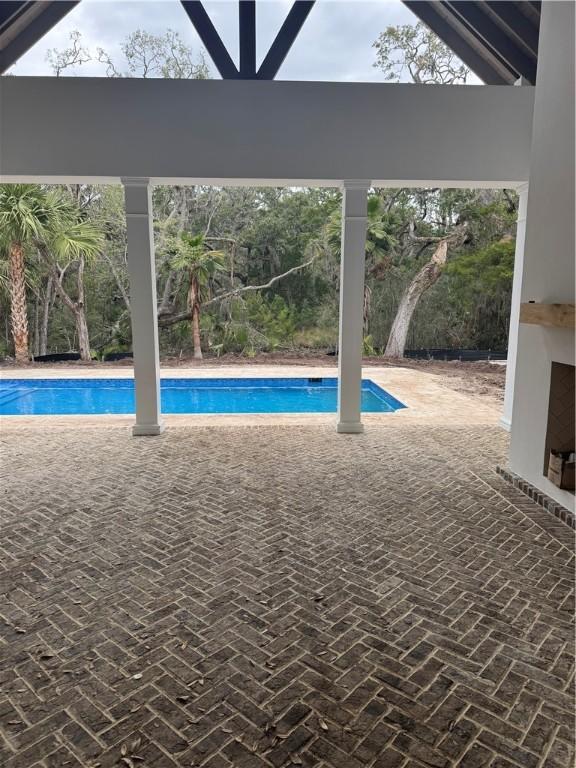 outdoor pool with a patio