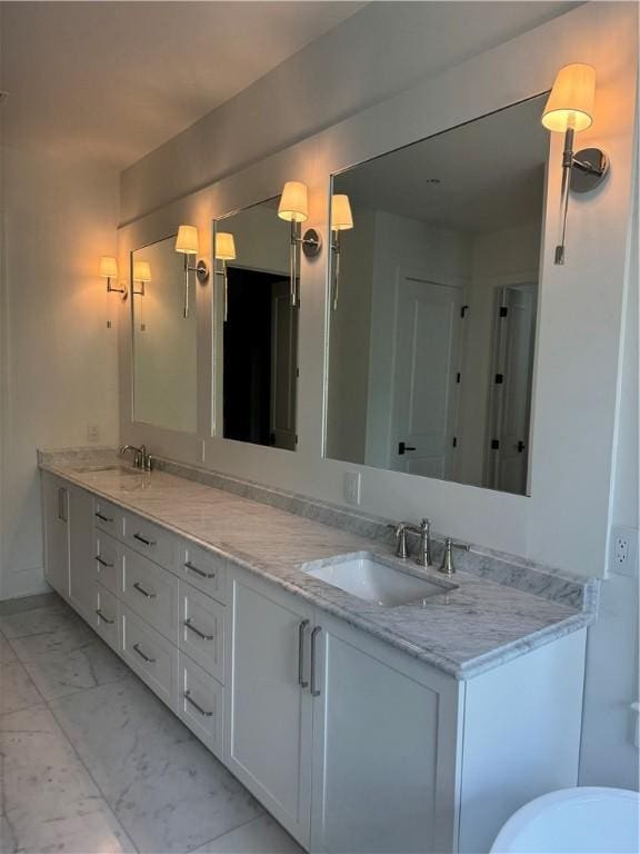 104 Point Ln, Saint Simons Island, GA 31522 - full bath featuring marble finish floors and double vanity
