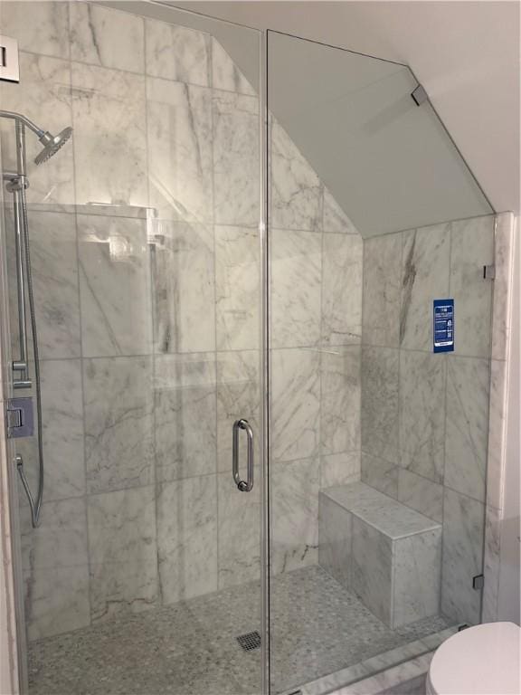 104 Point Ln, Saint Simons Island, GA 31522 - bathroom featuring a stall shower and toilet