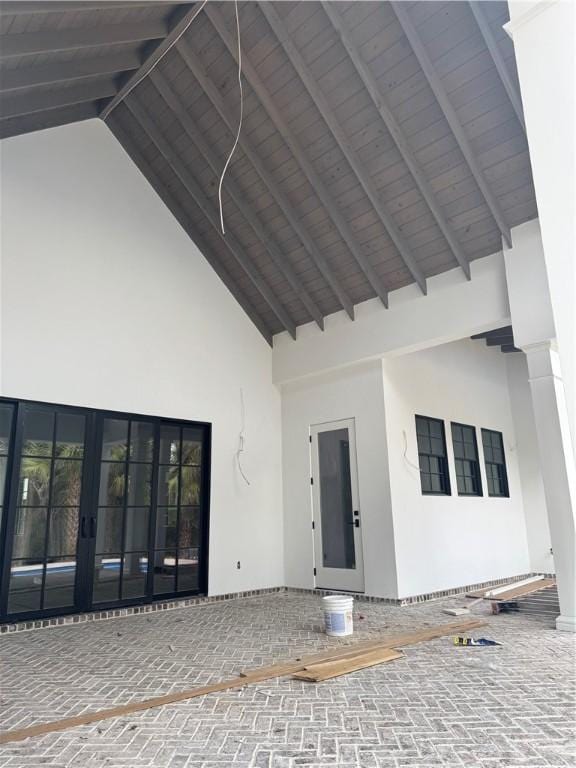 entrance to property with stucco siding