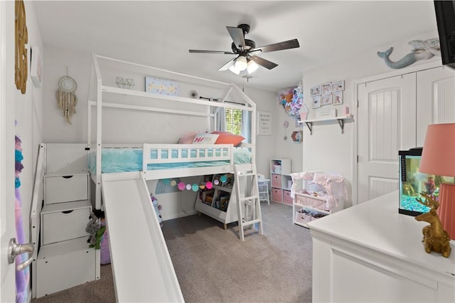 carpeted bedroom with ceiling fan