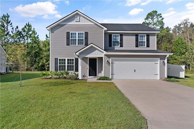 view of front of house featuring a front lawn and a garage