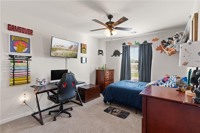 carpeted bedroom featuring ceiling fan