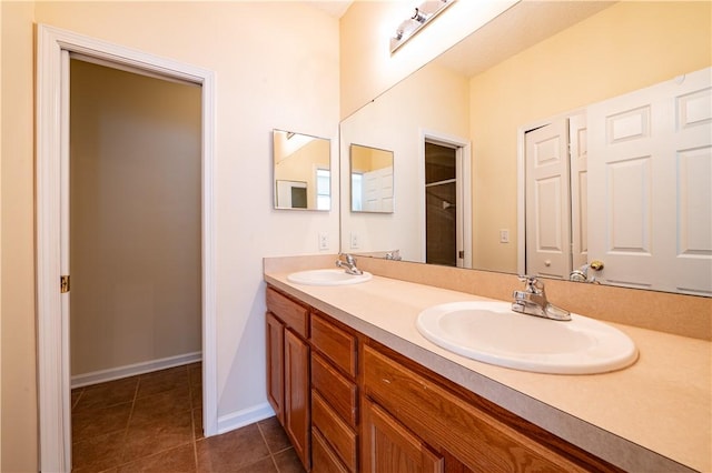 bathroom featuring tile patterned floors and vanity