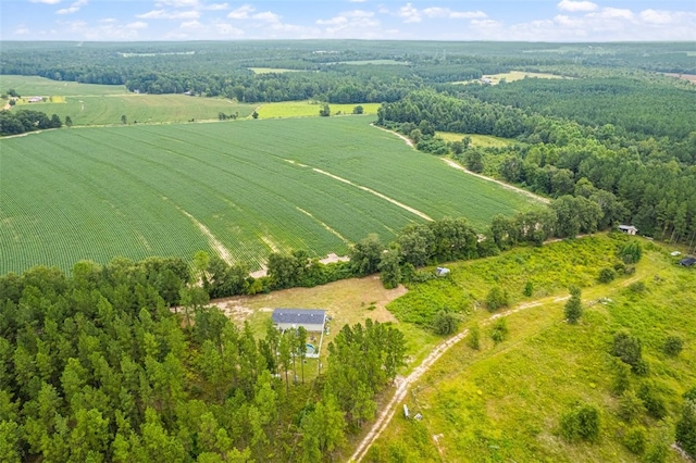 birds eye view of property with a rural view