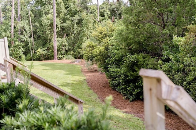 801 Mariners Cir, Saint Simons Island, GA 31522 - view of grassy yard featuring a wooded view