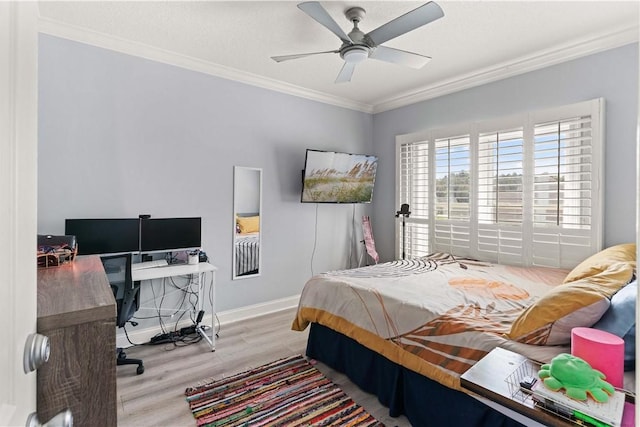 bedroom with ceiling fan, crown molding, and light hardwood / wood-style flooring