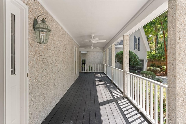 wooden terrace with ceiling fan