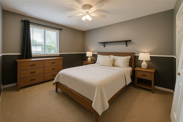 146 Sherwood Forest Cir, Brunswick, GA 31525 - bedroom with light colored carpet, ceiling fan, and baseboards