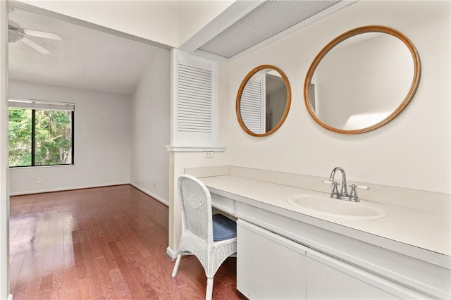 893 Wimbledon Dr, Saint Simons Island, GA 31522 - bathroom featuring wood finished floors, baseboards, vanity, and a ceiling fan