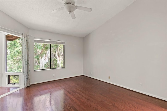 893 Wimbledon Dr, Saint Simons Island, GA 31522 - unfurnished room with wood-type flooring, a ceiling fan, baseboards, and a textured ceiling