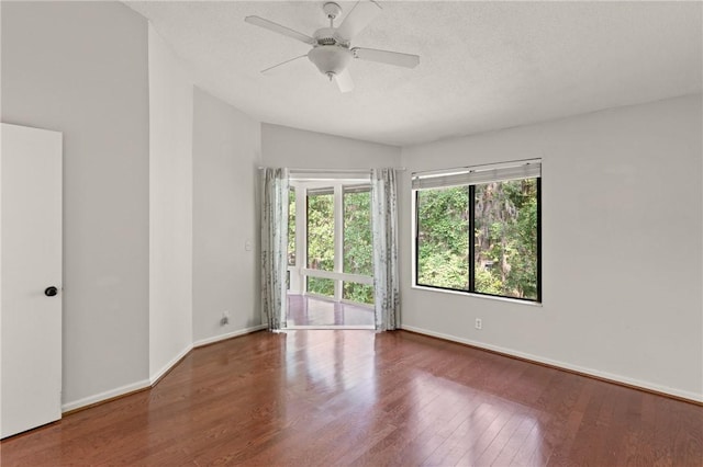 893 Wimbledon Dr, Saint Simons Island, GA 31522 - unfurnished room featuring wood finished floors, baseboards, a ceiling fan, and vaulted ceiling