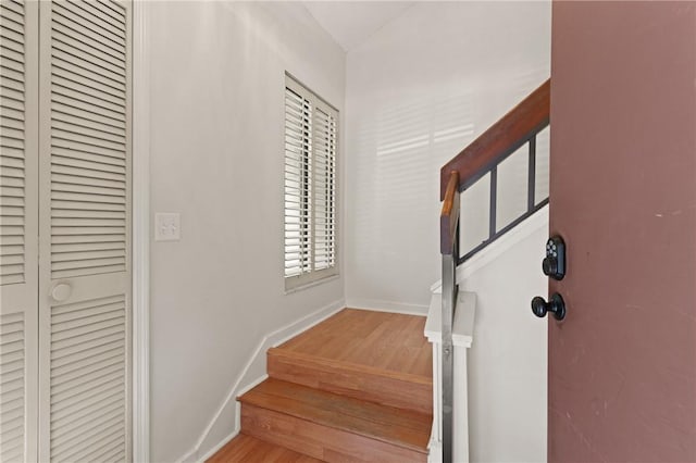 893 Wimbledon Dr, Saint Simons Island, GA 31522 - stairs featuring wood finished floors and baseboards