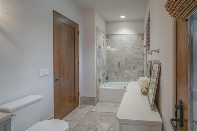 full bathroom with vanity, toilet, and enclosed tub / shower combo