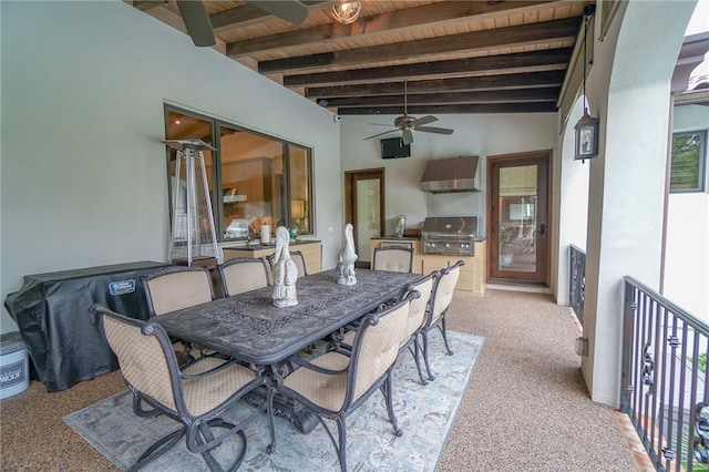 carpeted dining room with vaulted ceiling with beams, ceiling fan, and wooden ceiling