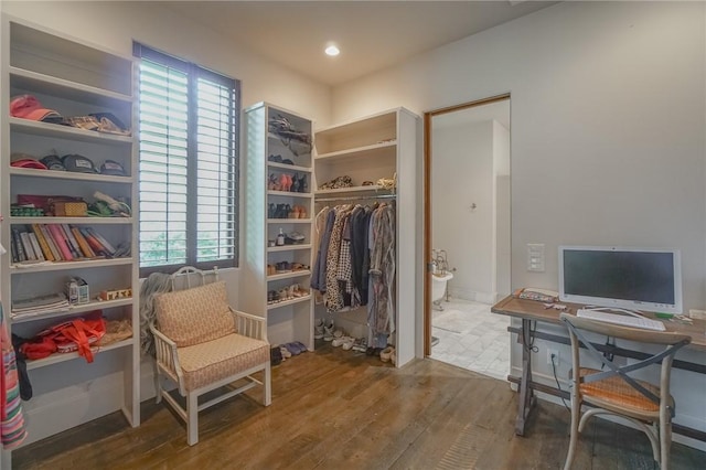 interior space featuring plenty of natural light and hardwood / wood-style flooring