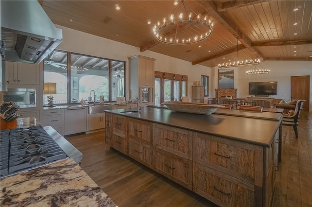 kitchen with appliances with stainless steel finishes, island range hood, dark hardwood / wood-style flooring, white cabinetry, and wood ceiling