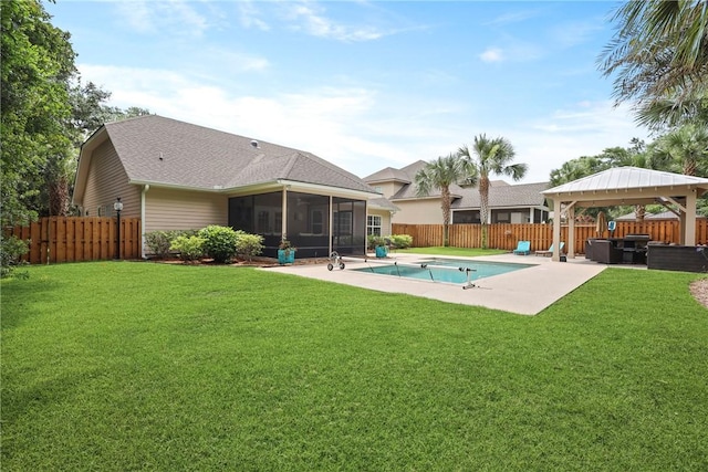 100 Southern Oaks Ln, Saint Simons Island, GA 31522 - view of swimming pool with a jacuzzi, a patio, a sunroom, a gazebo, and a fenced backyard
