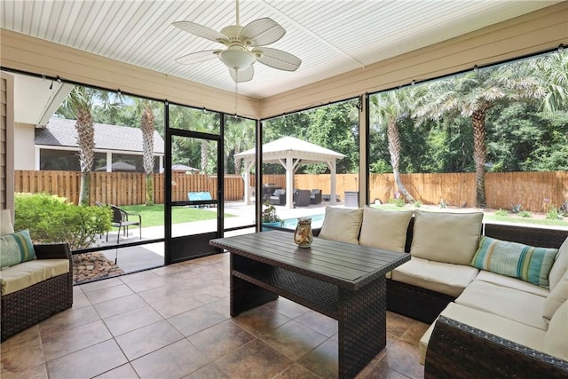 100 Southern Oaks Ln, Saint Simons Island, GA 31522 - sunroom / solarium with outdoor lounge area and a ceiling fan