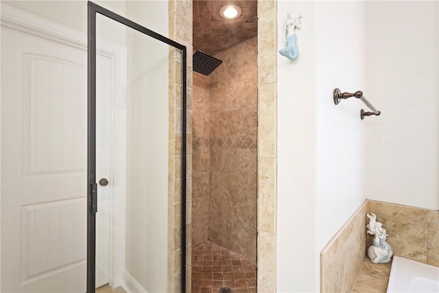 100 Southern Oaks Ln, Saint Simons Island, GA 31522 - bathroom featuring a stall shower and a tub to relax in