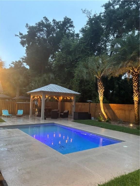 100 Southern Oaks Ln, Saint Simons Island, GA 31522 - view of pool with a gazebo, a patio area, and a fenced backyard