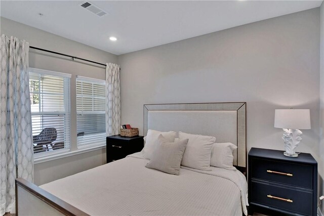 bedroom featuring recessed lighting and visible vents